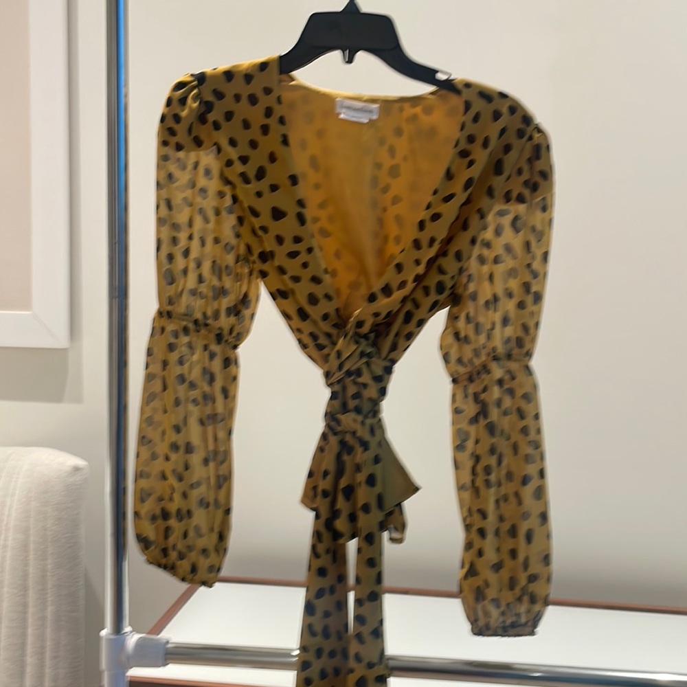Lovers and Friends cheetah print blouse size small.